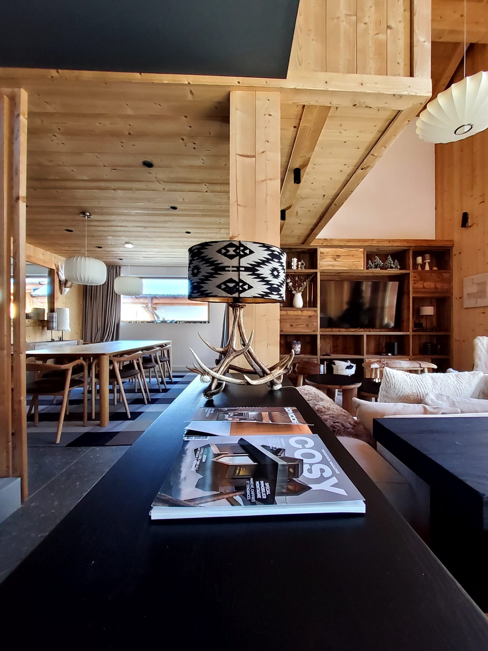 Chalet decorated by Au Chalet, wood lamp made from deer antler